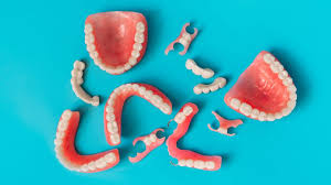 dentier complet, prothèse dentaire totale, dentier amovible, fausse dent, prothèse complète, dentier sur implants, édentement complet, soins dentier, confort dentier, remplacement dents manquantes